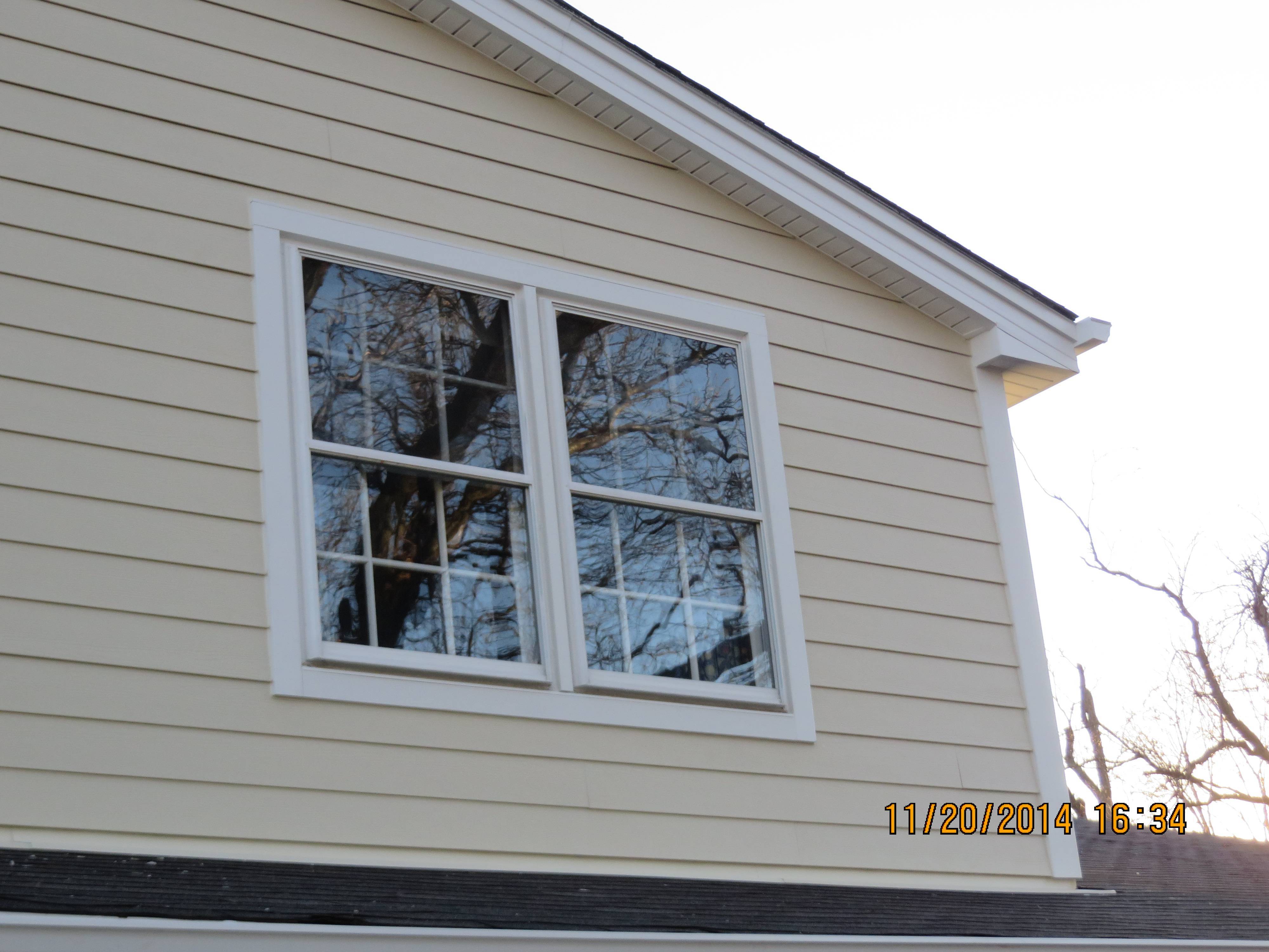 James Hardie Navajo Beige Plank Siding with Arctic White Hardie Fiber