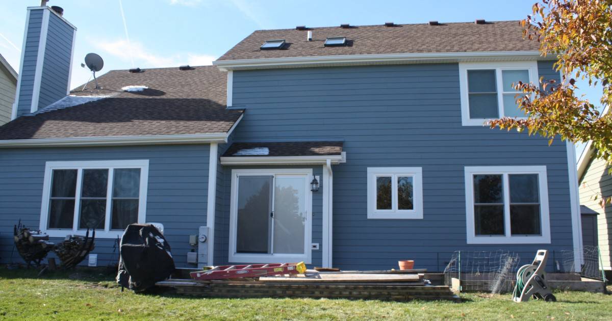 Boothbay Blue James Hardie Fiber Cement Siding & Arctic White HardieTrim with Alside Gutters