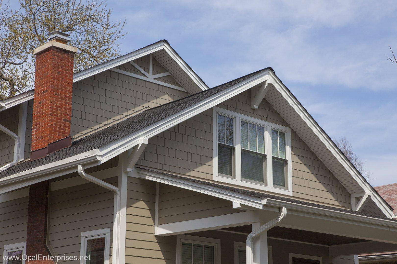 A Charming Upgrade featuring James Hardie Siding in Monterey Taupe & Shingle Accents Opal