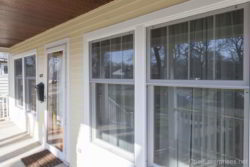 A cheerful upgrade with James Hardie Woodland Cream siding and Beechworth Windows.