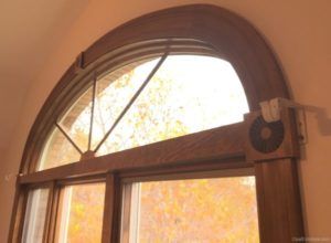 Andersen 100-Series window with custom stained decorative wood interior