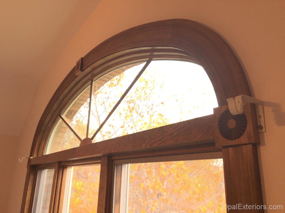 Andersen 100-Series window with custom stained decorative wood interior