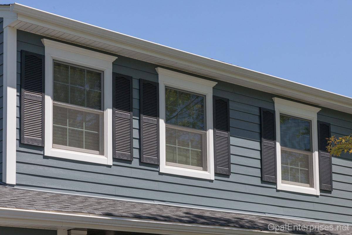 new siding, window trim, and shutters