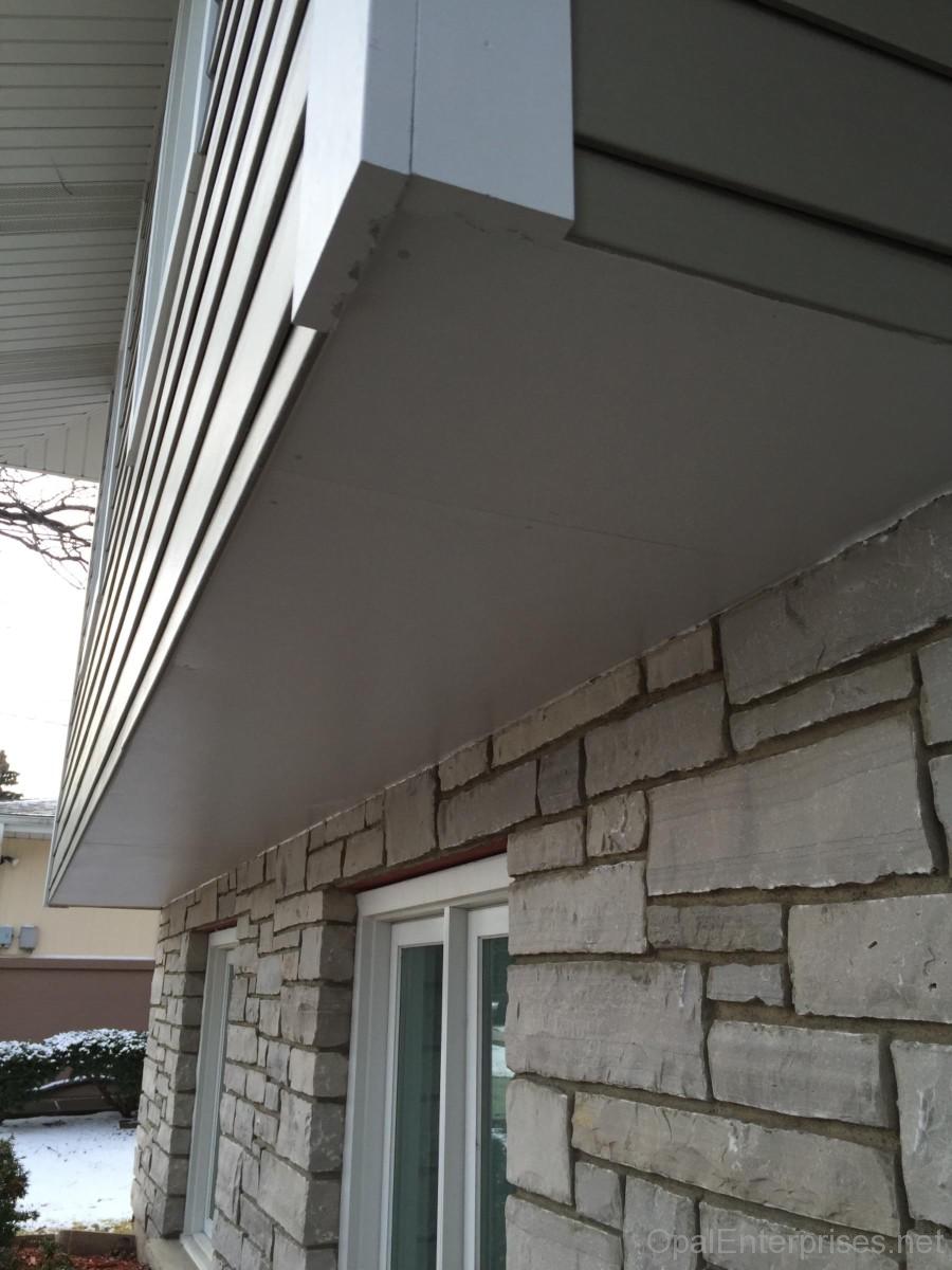 James Hardie Monterey Taupe siding with stone