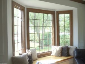 Andersen Bay windows with pine wood interiors and grid.