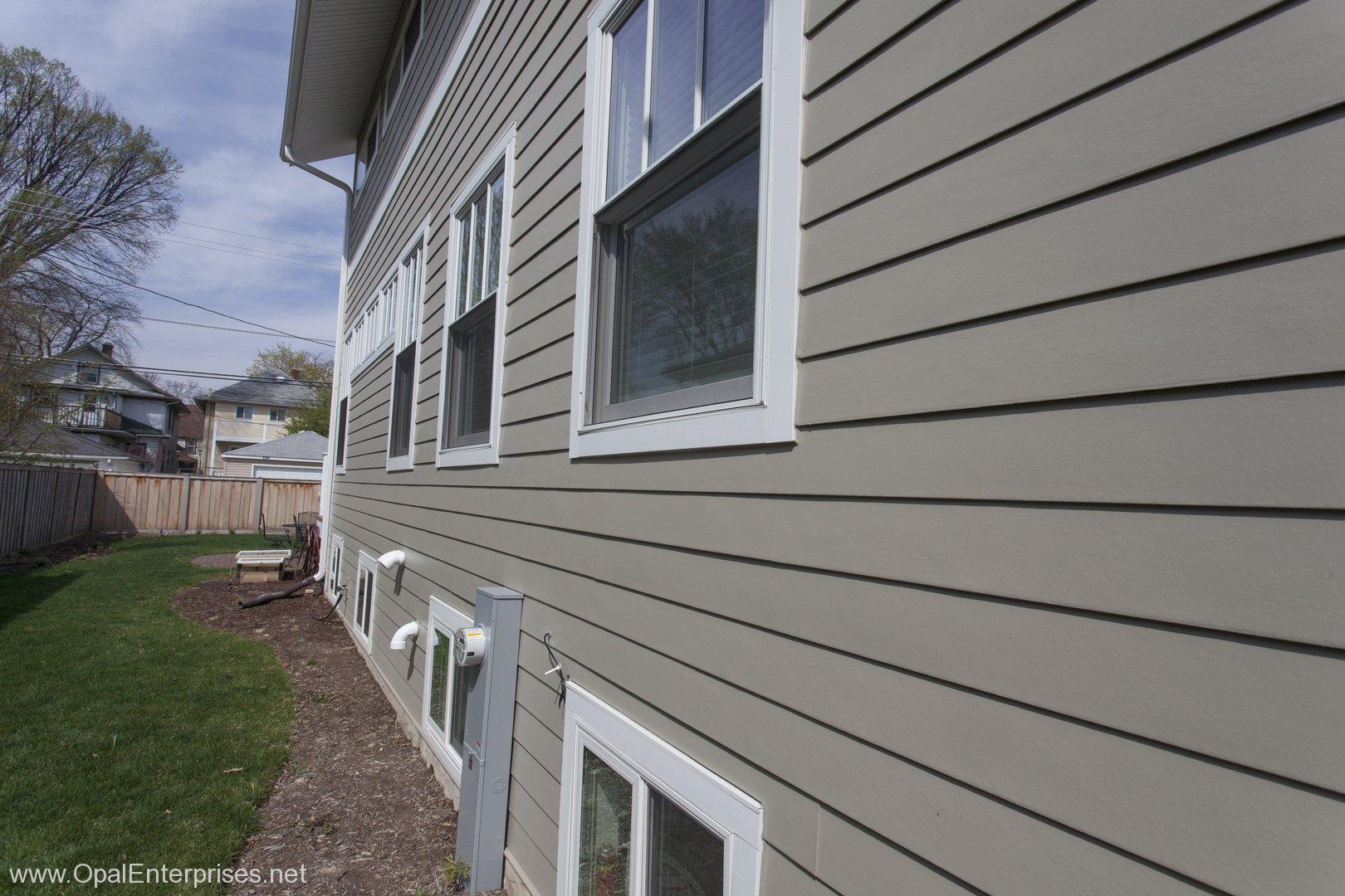 A sleek exterior with Hardie siding replacement from Opal Enterprises #OpalCurbAppeal