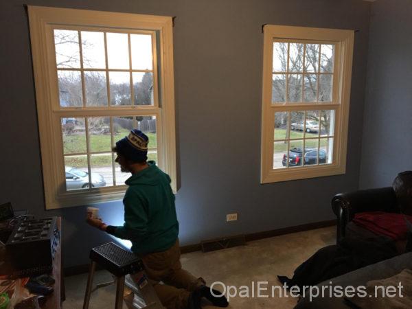 Finishing windows after window installation.