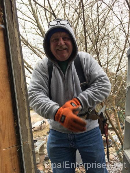 Opal Enterprises window contractor at work.