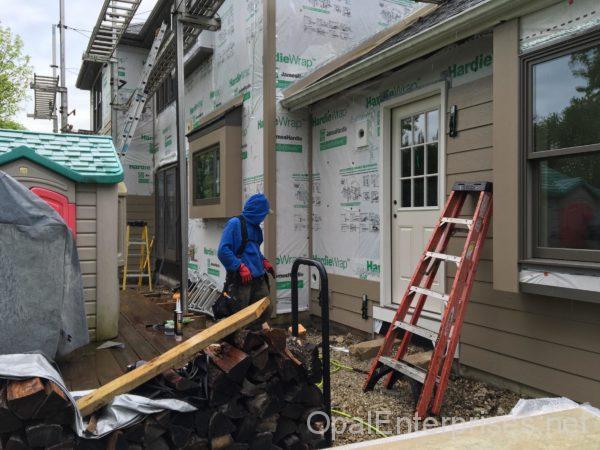Installing the fiber cement siding...