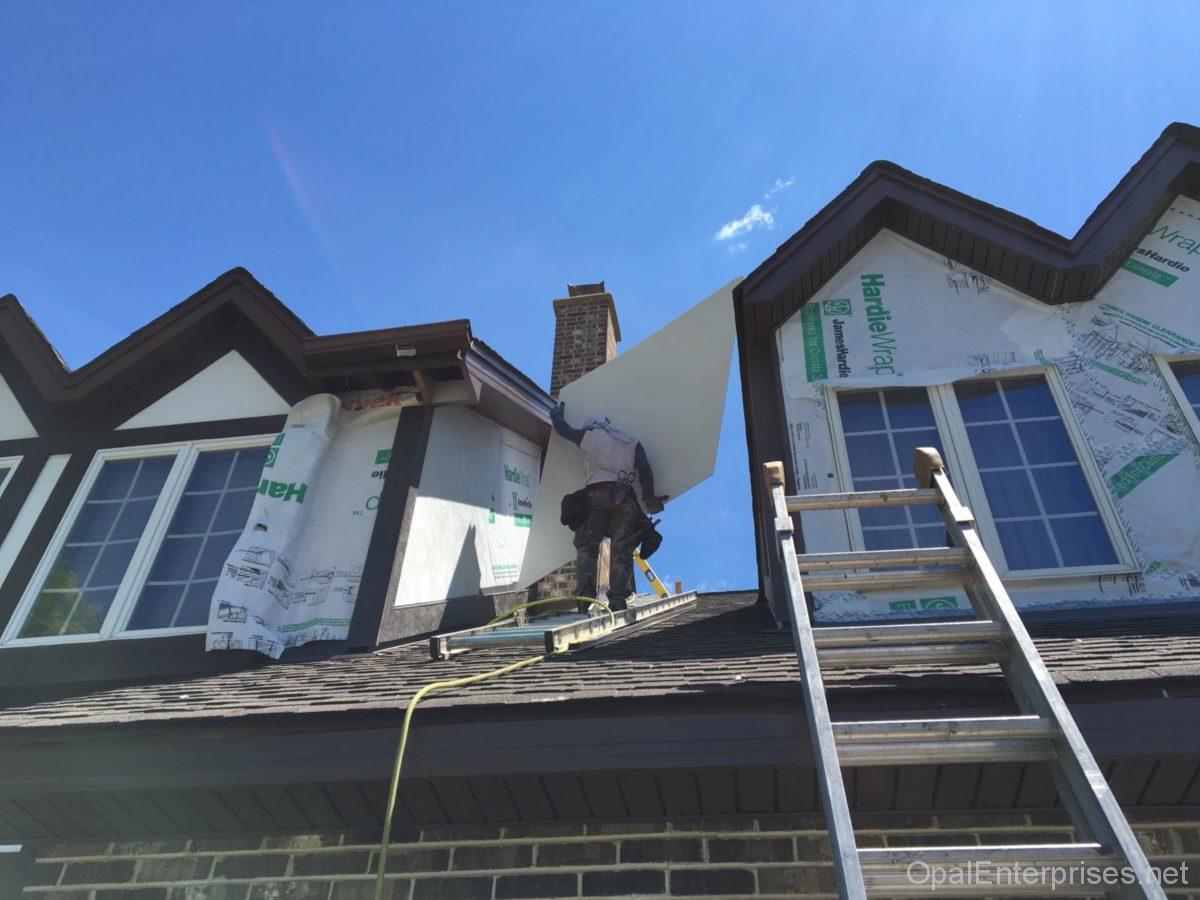 Carrying Hardie board - HardiePanel Stucco siding