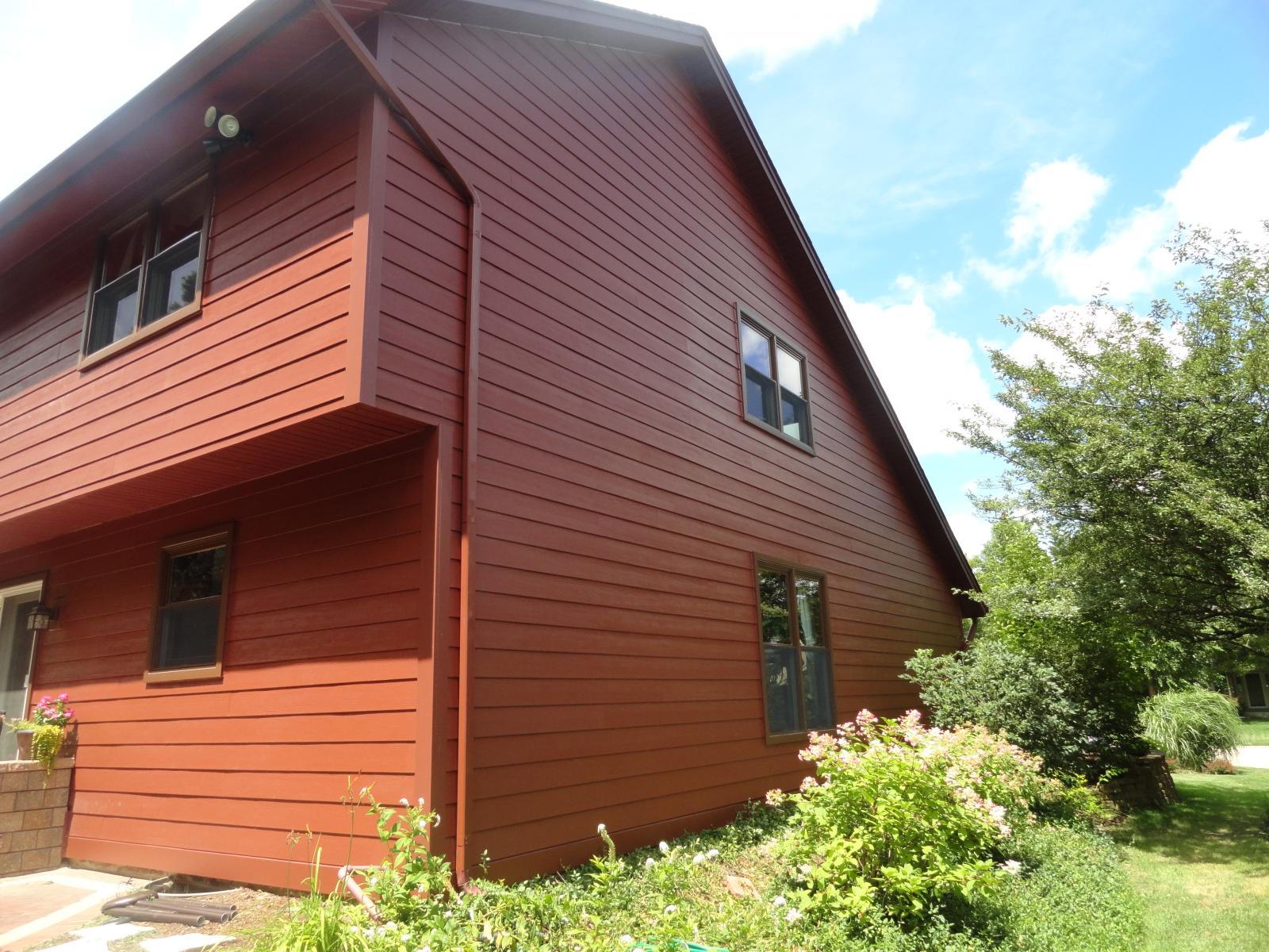 Countrylane Red James Hardie Siding with Andersen ASeries Windows in