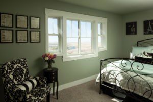 bedroom with white custom windows