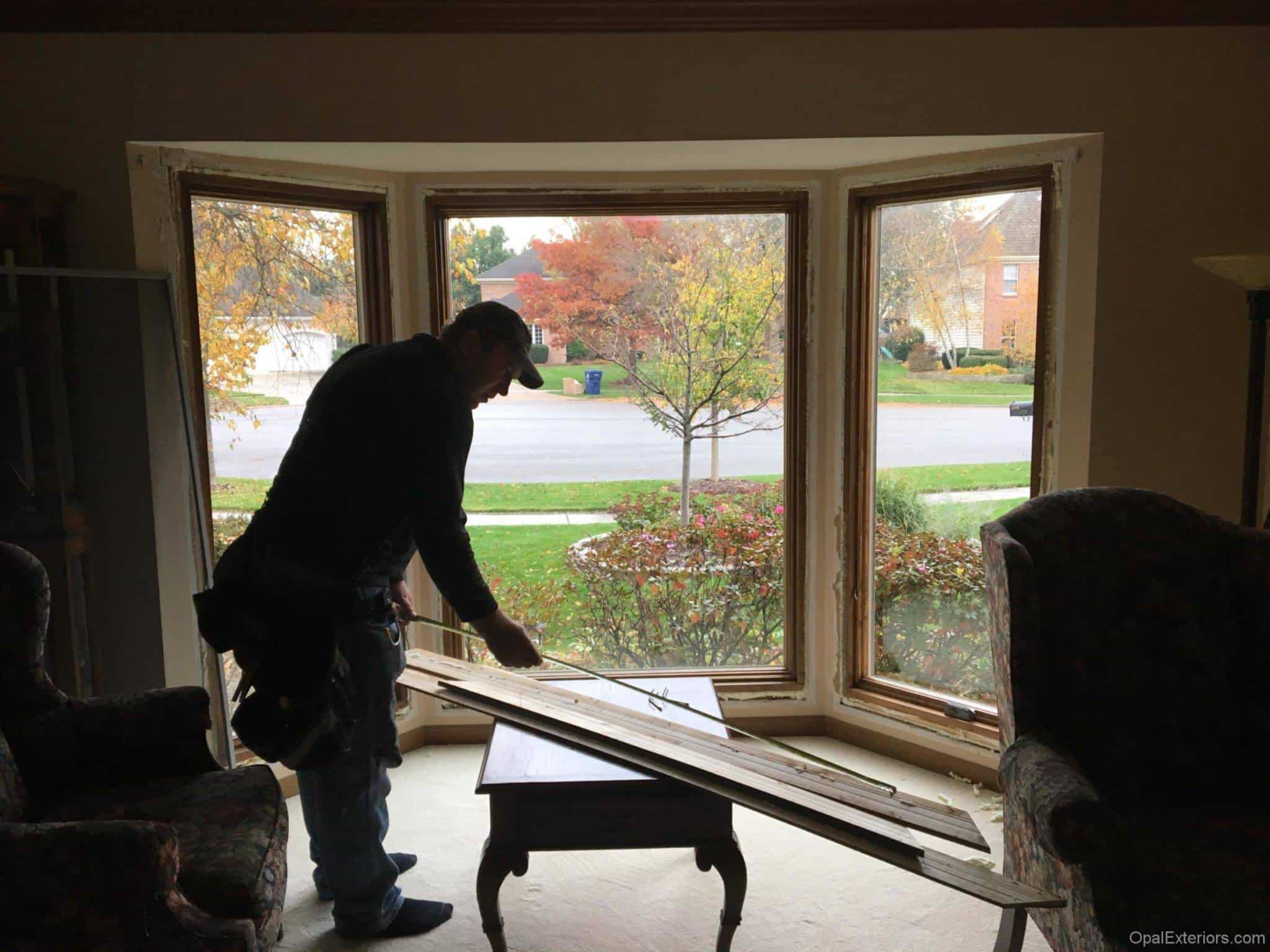 Opal crew installing window trim in Naperville