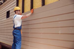 Review the cost of putting James Hardie siding on a house with our team.