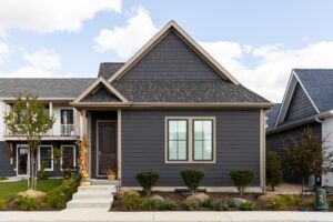 Get a quote on new siding, shades, and more to compliment your dark house exterior!