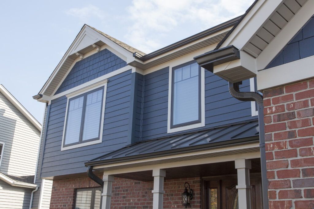 James Hardie Siding installed with decorative elements, shake, soffit, fascia and gutters