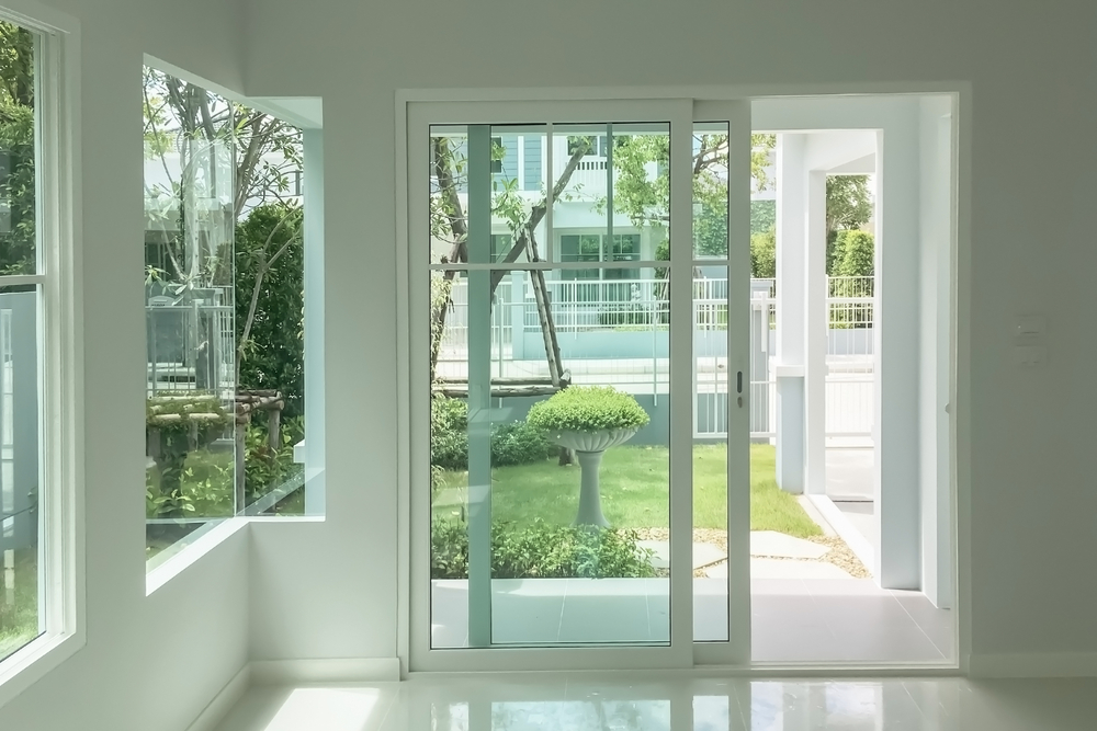 White vinyl sliding door on Winnetka home.