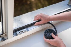 Naperville window insulation professional ensures proper insulation around new windows.