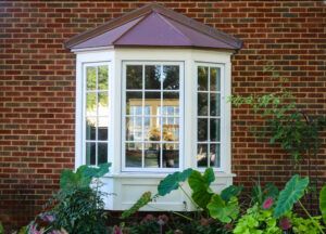 The outside of a Naperville home with bay windows.